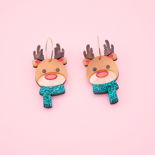 Reindeer earrings with shiny red mirror noses, brown antlers, and green glitter scarves on gold hoops — festive Christmas jewellery by Pop Heart Studio.