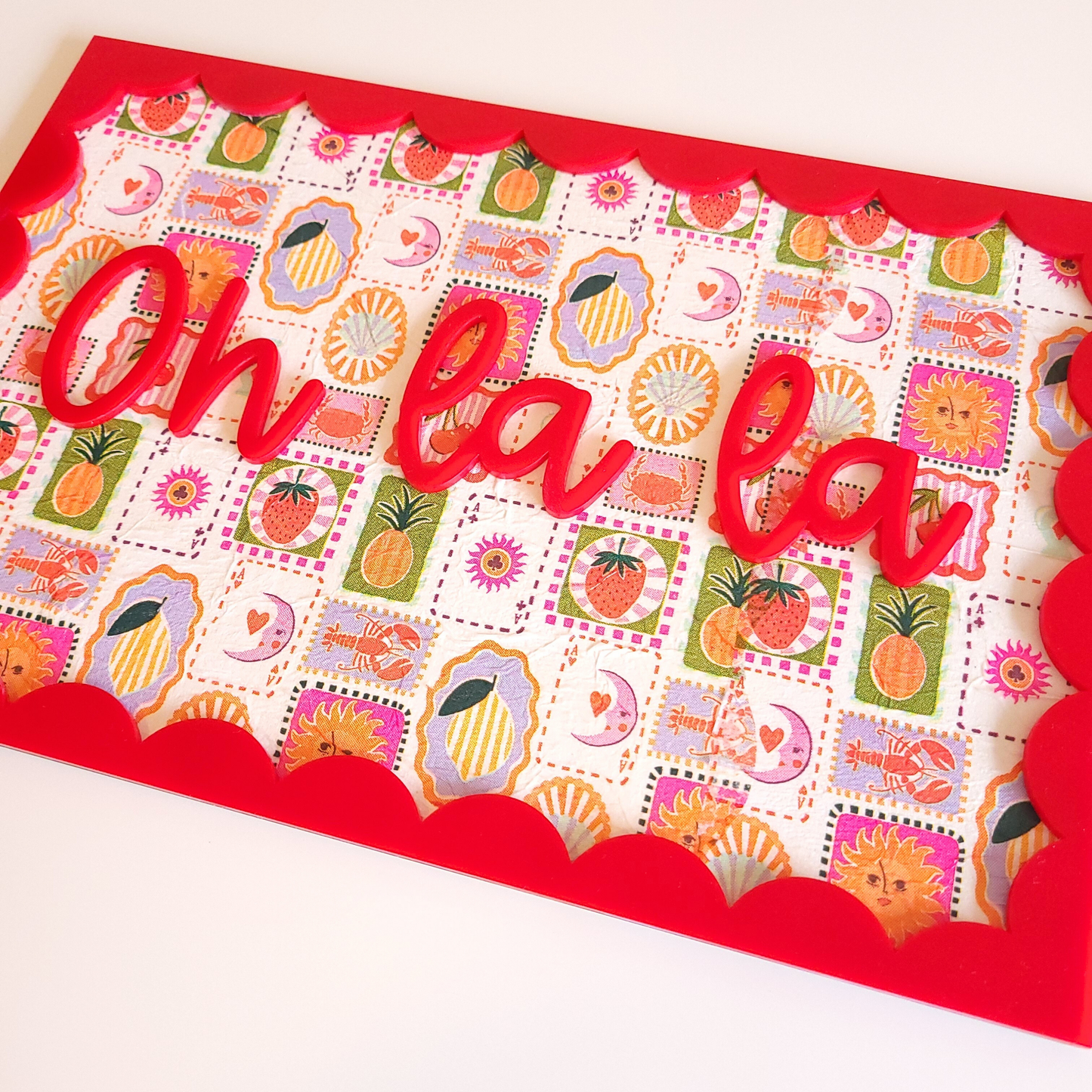 Playful dopamine decor wall sign in red acrylic with vibrant fruit and floral decoupage